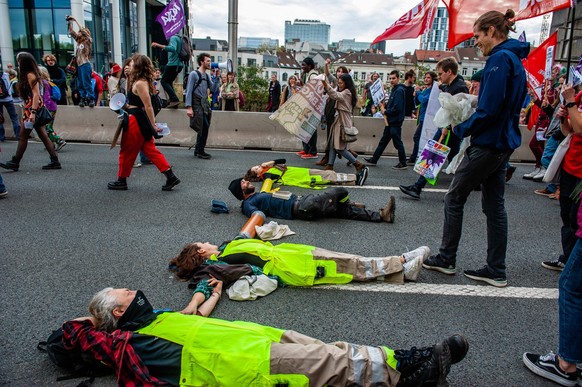 Walk For Your Future Climate March Organized In Brussels Climate activists are laying on the ground blocking the street, during a massive climate demonstration organized in Brussels, on October 23rd,  ...
