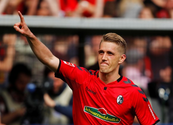 Soccer Football - Bundesliga - SC Freiburg v FC Cologne - Schwarzwald-Stadion, Freiburg, Germany - April 28, 2018 SC Freiburg&#039;s Nils Petersen celebrates scoring their second goal REUTERS/Kai Pfaf ...