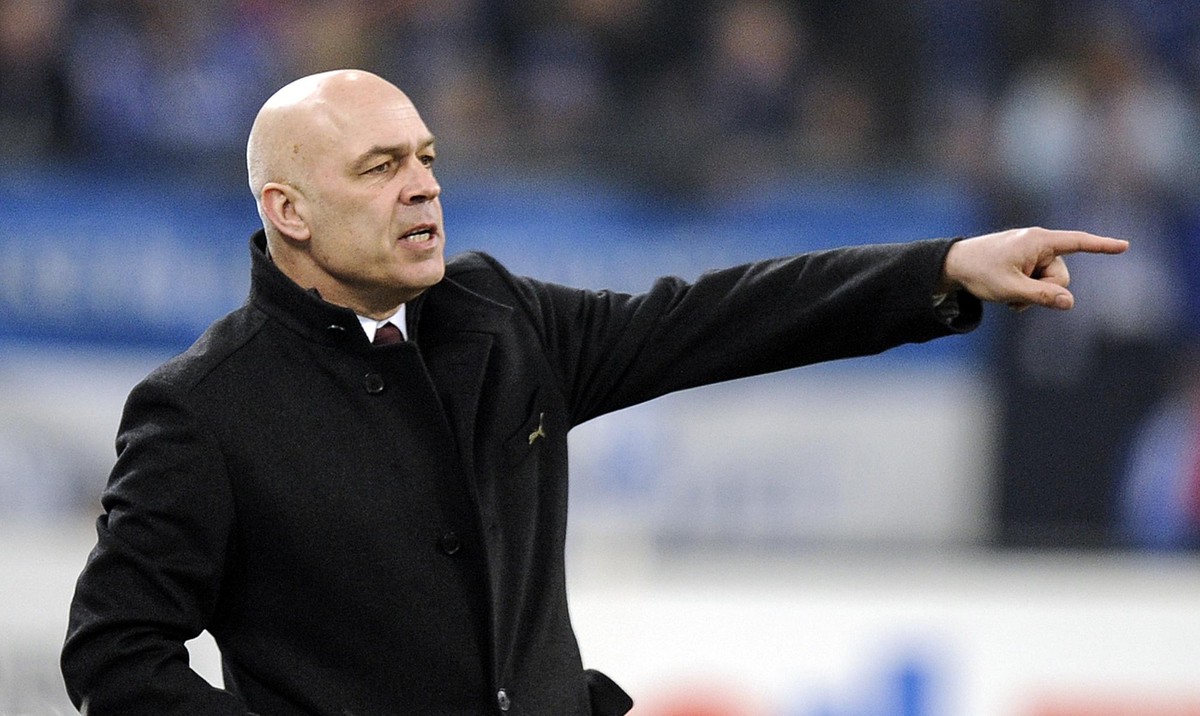 FILE - In this March 12, 2010 file photo, Stuttgart's head coach Christian Gross reacts during the German first division Bundesliga soccer match between FC Schalke 04 and VfB Stuttgart in Gelsenk ...