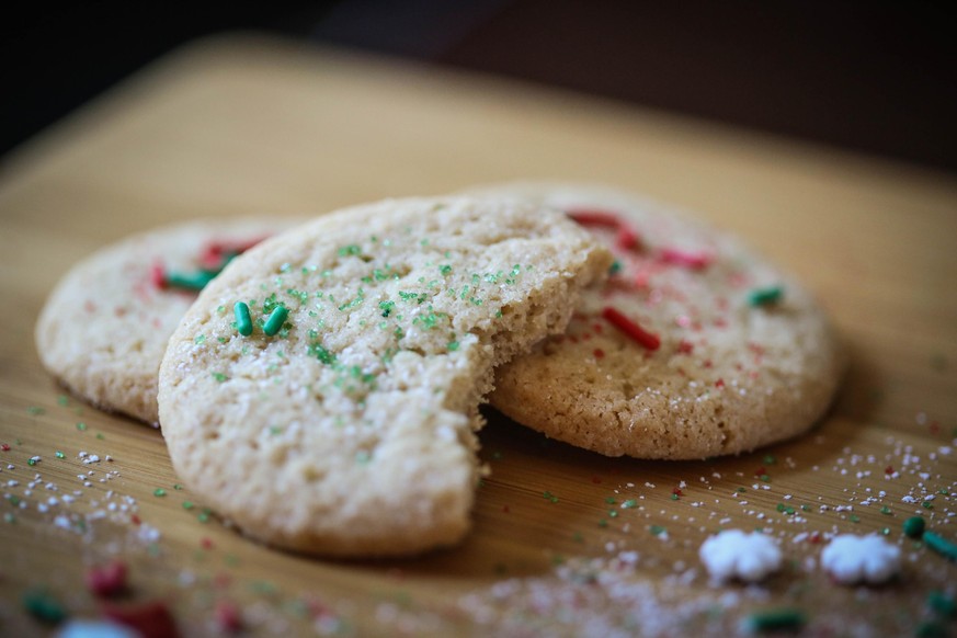 A photo of a half eaten Christmas cookie