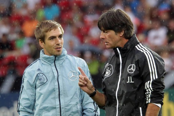 Bild aus dem Jahr 2013: Der damalige Nationalmannschaftskapitän Philipp Lahm mit Bundestrainer Jogi Löw.