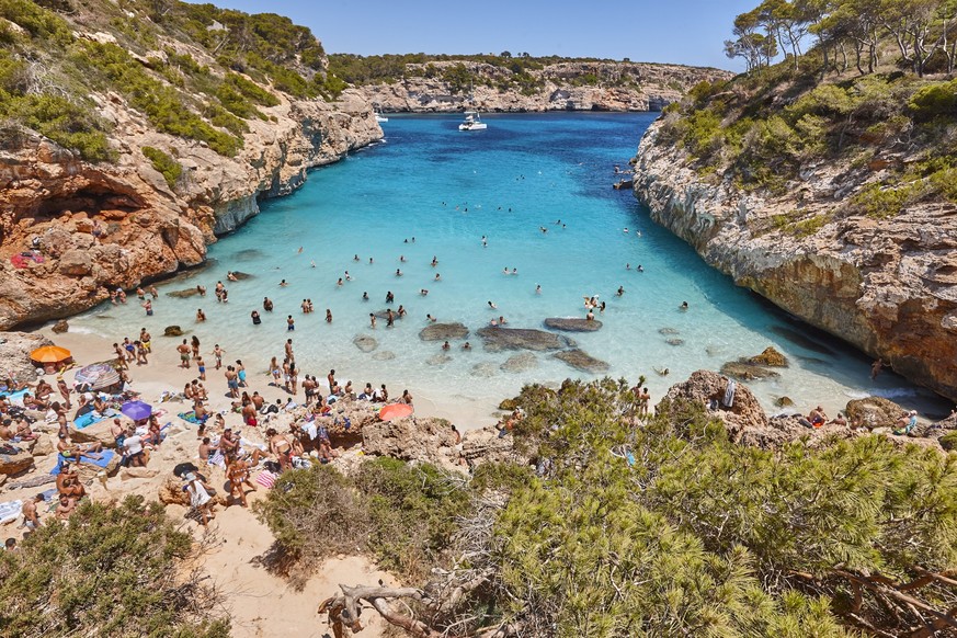 Turquoise waters in Mallorca. Moro beach. Mediterranean coastline. Spain