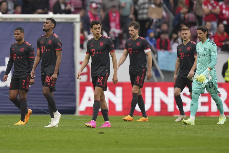 Bayern players leave the pitch after the German Bundesliga soccer match between 1. FSV Mainz 05 and FC Bayern Munich at the Mewa Arena in Mainz, Germany, Saturday, April 22, 2023. (AP Photo/Matthias S ...