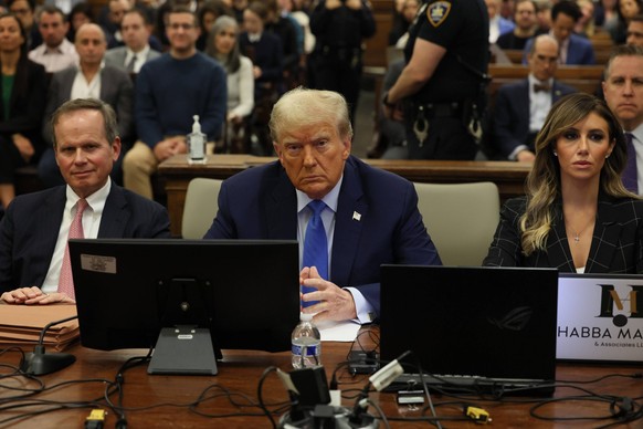 Former United States President Donald Trump waits in the courtroom on the day that he will testify in his civil fraud trial at State Supreme Court on Monday, November 6, 2023 in New York City. The cas ...