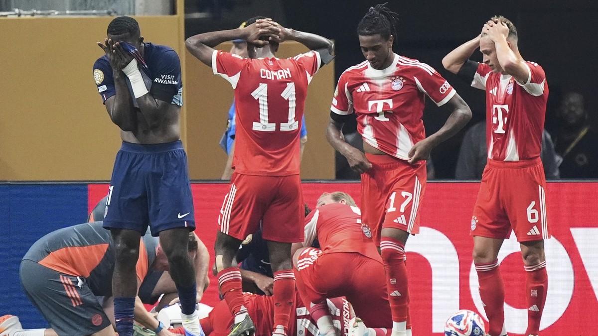 Bayern Munich&#039;s Jamal Musiala lies on the ground during the Club World Cup quarterfinal soccer match between PSG and Bayern Munich in Atlanta, Saturday, July 5, 2025. (AP Photo/Mike Stewart)