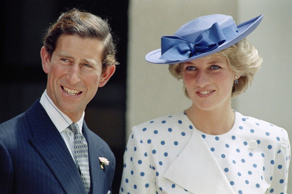 FILE - Britain's Prince Charles with his wife Princess Diana in front of Lodge Canberra, Australia, Nov. 7, 1985. After spending much of his adult life in the shadow of Queen Elizabeth II, Prince Char ...