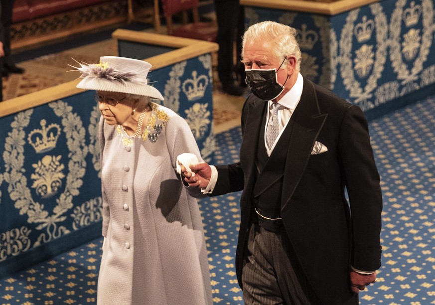 Queen to miss State Opening. File photo dated 11/05/21 of Queen Elizabeth II accompanied by the Prince of Wales, as she proceeds through the Royal Gallery before delivering her speech during the State ...