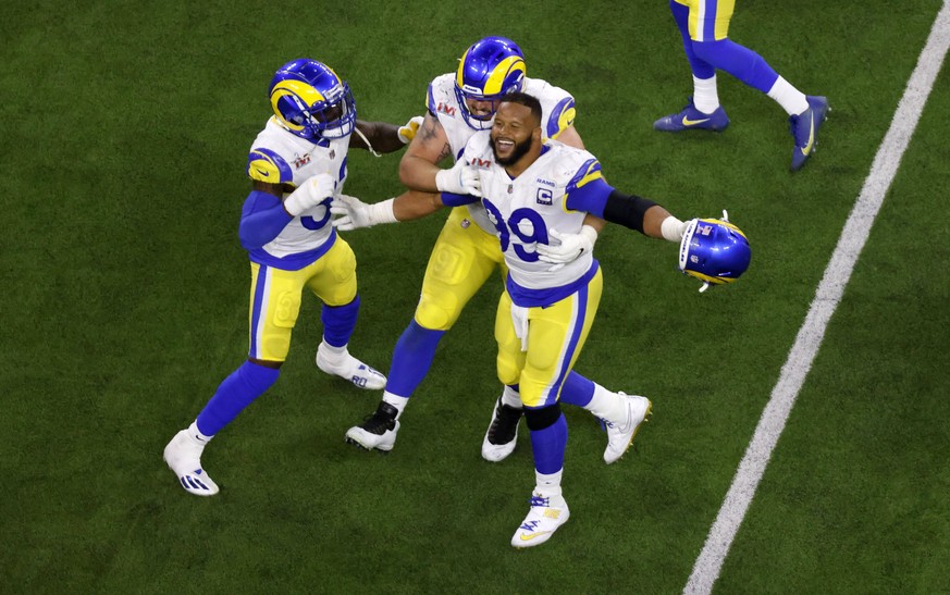 Los Angeles Rams defensive tackle Aaron Donald 99 celebrates his game winning sack of Cincinnati Bengals quarterback Joe Burrow 9 at the NFL, American Football Herren, USA Super Bowl 56 LVI football g ...