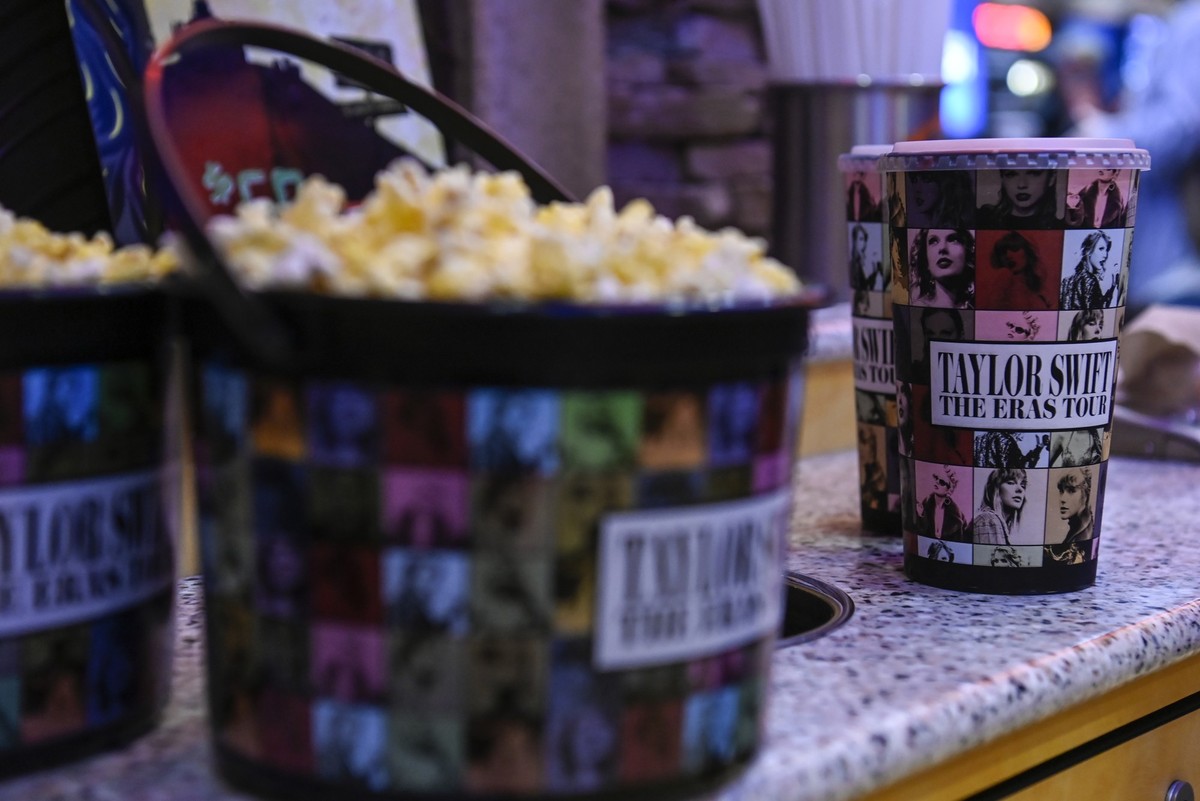 A collection bucket and cup for “Taylor Swift: The Eras Tour” film is sold at Regal Cinemas on Friday, Oct. 13, 2023, in Lynchburg, Va. (Paige Dingler/The News & Advance via AP)