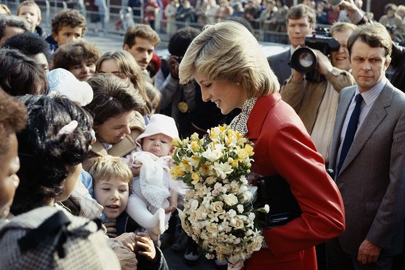 Princess Diana wearing a Jasper Conran suit during a visit to a community centre in Brixton, October 1983. (Photo by Princess Diana Archive/Getty Images)