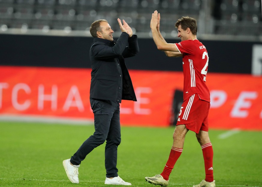 Fussball 1. Bundesliga/ Borussia Dortmund - FC Bayern Muenchen 2:3 Trainer Hans-Dieter Hansi FLICK M, und Thomas MUELLER Müller, M, Schlussjubel, Jubel, jubeln, Freude, cheers, Fussball 1. Bundesliga, ...