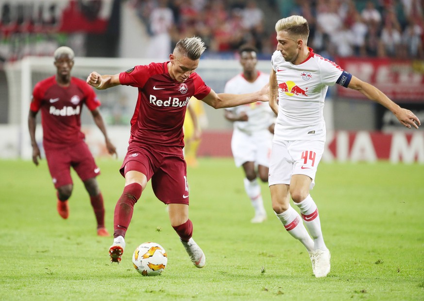 SOCCER - EL, RB Leipzig vs RBS LEIPZIG,GERMANY,20.SEP.18 - SOCCER - UEFA Europa League, group stage, RasenBallsport Leipzig vs Red Bull Salzburg. Image shows Hannes Wolf (RBS) and Kevin Kampl (RB Leip ...