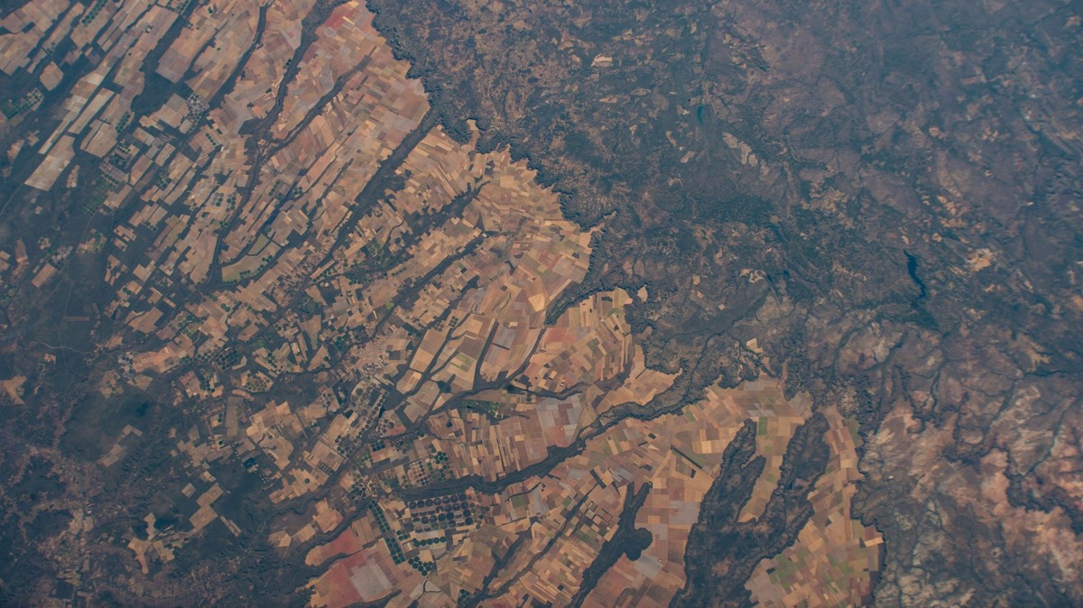 July 8, 2022 - Earth Atmosphere - Agricultural activities are etched in the western portion of the Brazilian state of Bahia which is part of the Cerrado, a vast tropical savanna in the South American  ...