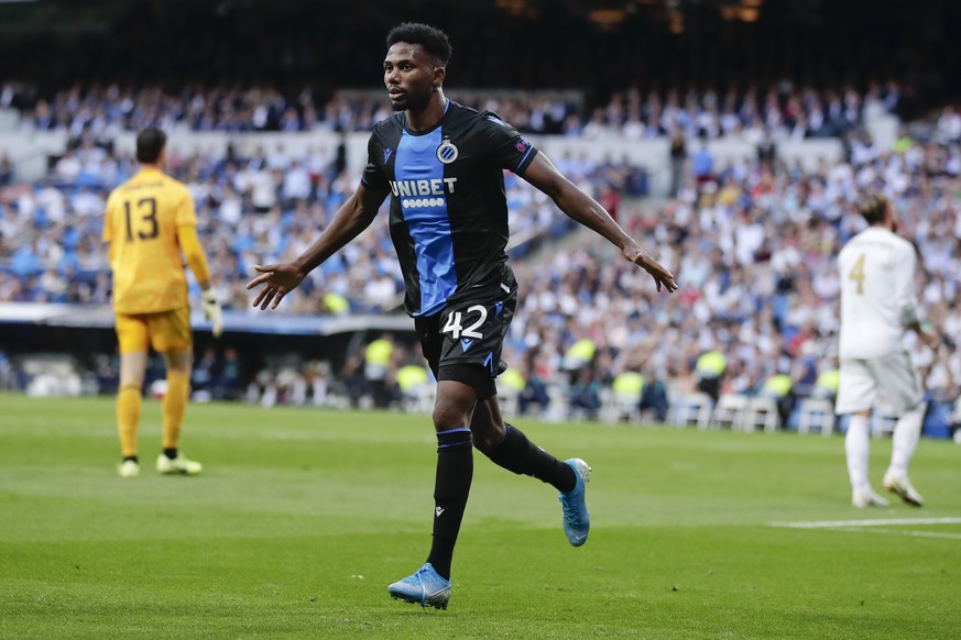 Brugge&#039;s Emmanuel Dennis celebrates after scoring his side&#039;s second goal during the Champions League group A soccer match between Real Madrid and Club Brugge, at the Santiago Bernabeu stadiu ...