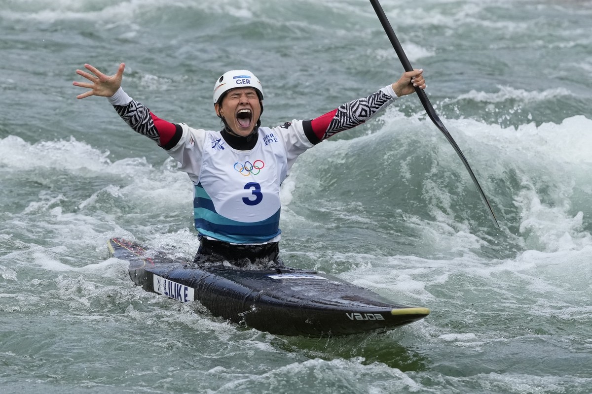 Elena Lilik of Germany reacts in the finish area of the women's canoe single finals at the 2024 Summer Olympics, Wednesday, July 31, 2024, in Vaires-sur-Marne, France. (AP Photo/Kirsty Wiggleswor ...