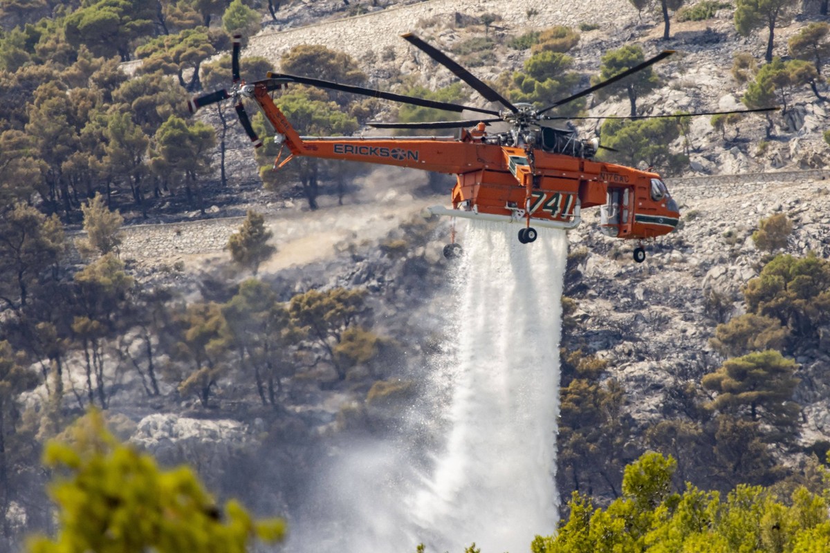 Mount Parnitha Wildfire Near Athens Mount Parnitha wildfire at the outskirts of Athens with visible smoke after the catastrophic blaze, resulting in an environmental disaster, at the forest north of A ...