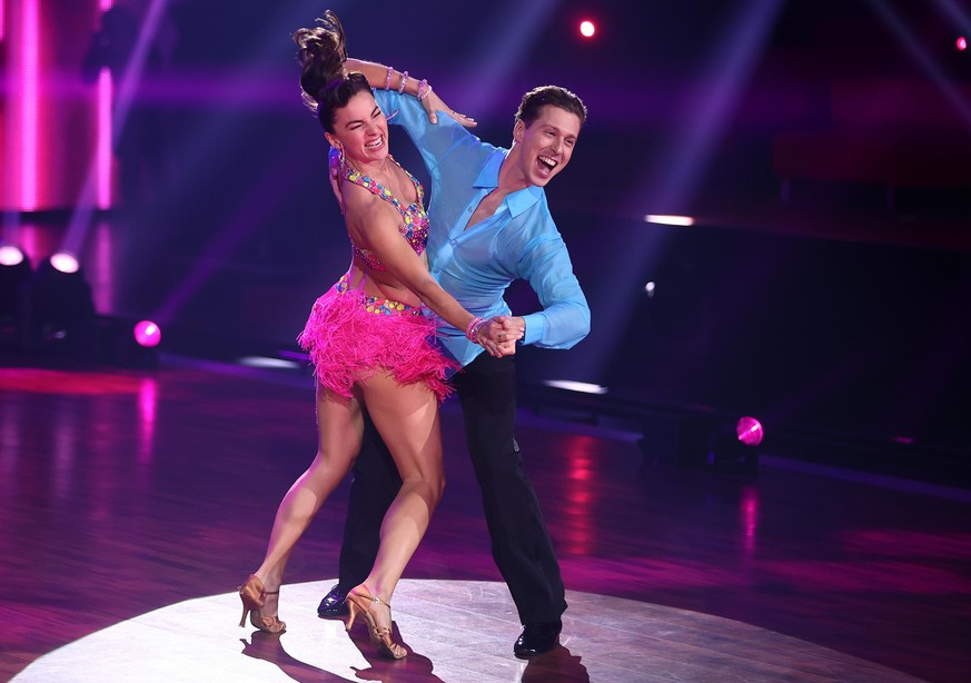 COLOGNE, GERMANY - MARCH 19: Renata Lusin and Valentin Lusin perform on stage during the 3rd show of the 14th season of the television competition &quot;Let&#039;s Dance&quot; on March 19, 2021 in Col ...