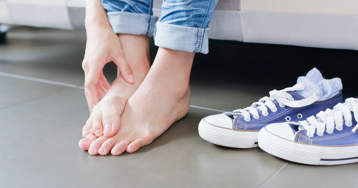 close up woman athlete foot with health concept