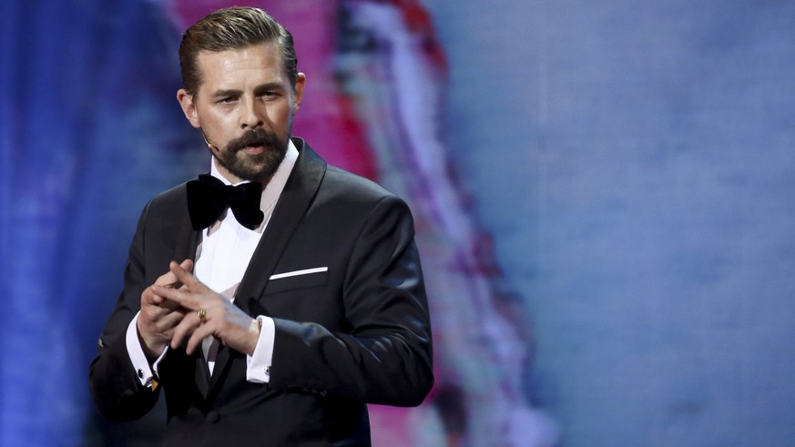 BERLIN, GERMANY - NOVEMBER 07: German presenter Klaas Heufer-Umlauf is seen on stage during the GQ Men of the Year Award show at Komische Oper on November 7, 2019 in Berlin, Germany. (Photo by Isa Fol ...