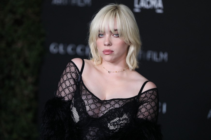 LOS ANGELES, CALIFORNIA, USA - NOVEMBER 06: Singer Billie Eilish wearing a Gucci outfit arrives at the 10th Annual LACMA Art + Film Gala 2021 held at the Los Angeles County Museum of Art on November 6 ...
