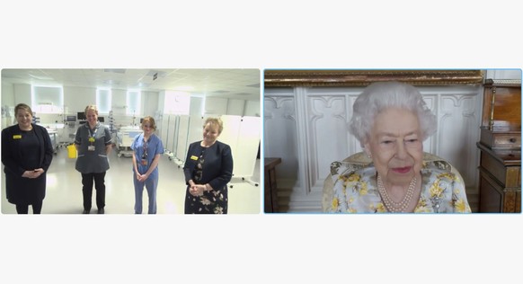 HANDOUT - 10.04.2022, Gro�britannien, London: In diesem vom Buckingham Palace ver�ffentlichten Videostandbild spricht die britische K�nigin Elisabeth II. mit Lucie Butler, Pflegedirektorin und gesch�f ...