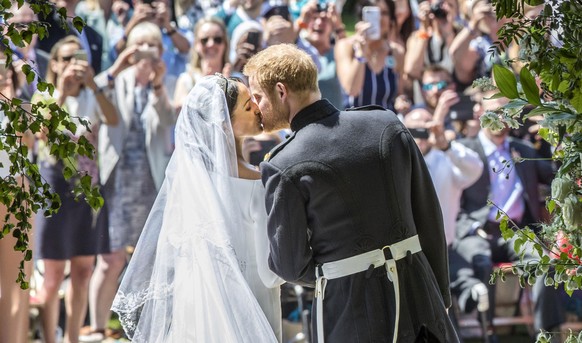 The Duke and Duchess of Sussex&#039;s second wedding anniversary. File photo 19/05/18 of Meghan Markle and Prince Harry kissing on the steps of St George&#039;s Chapel at Windsor Castle following thei ...
