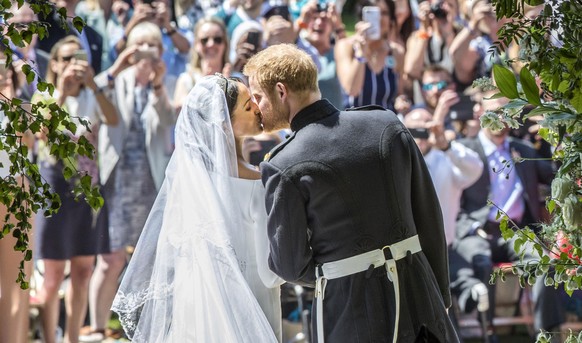 The Duke and Duchess of Sussex&#039;s second wedding anniversary. File photo 19/05/18 of Meghan Markle and Prince Harry kissing on the steps of St George&#039;s Chapel at Windsor Castle following thei ...