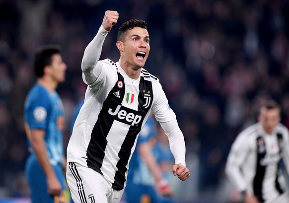 FILE PHOTO: Soccer Football - Champions League - Round of 16 Second Leg - Juventus v Atletico Madrid - Allianz Stadium, Turin, Italy - March 12, 2019 Juventus' Cristiano Ronaldo celebrates scoring the ...