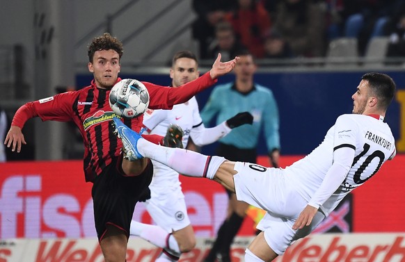 10.11.2019, xjhx, Fussball 1.Bundesliga, SC Freiburg - Eintracht Frankfurt emspor, v.l. Luca Waldschmidt SC Freiburg, Filip Kostic Eintracht Frankfurt DFL/DFB REGULATIONS PROHIBIT ANY USE OF PHOTOGRAP ...