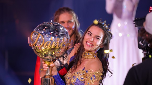 COLOGNE, GERMANY - MAY 28: Renata Lusin poses with the trophy during the final show of the 14th season of the television competition &quot;Let&#039;s Dance&quot; on May 28, 2021 in Cologne, Germany. ( ...