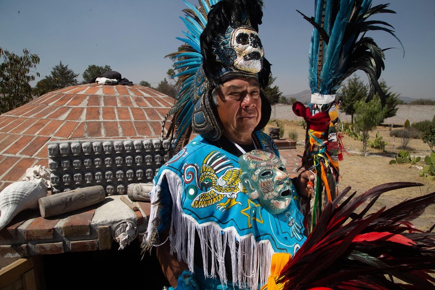 A man poses dressed as aztec warrior front a Temazcal as part of a pre-hispanic ceremony at archeological zone. Teotihuacan, Mexico, August 26, 2021. Photo by Ricardo Castelan/Eyepix/ABACAPRESS.COM