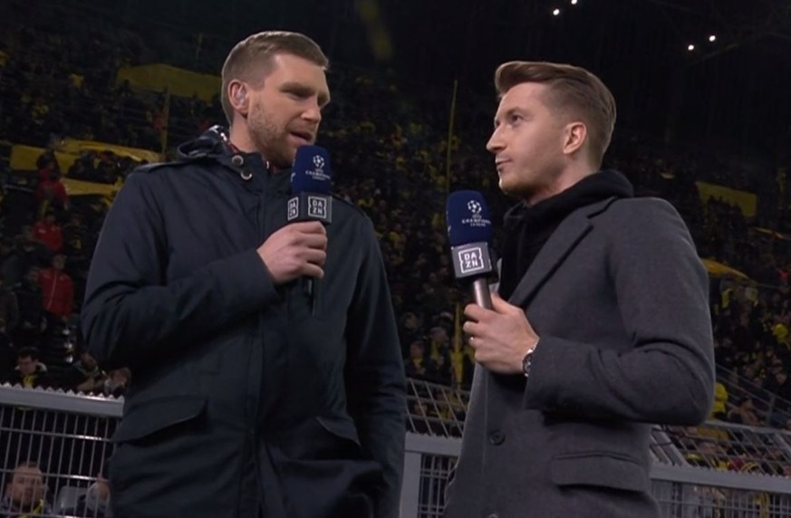 Überraschung! Per Mertesacker (l.) und Marco Reus im Interview vor dem Spiel BVB gegen PSG.