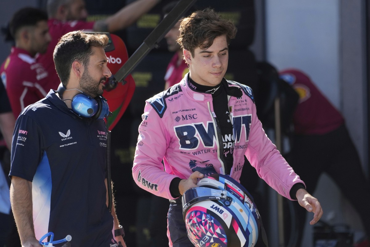 Alpine driver Franco Colapinto of Argentina walks through the pit lane after he failed to qupass into the next round of the qualifying at the Red Bull Ring racetrack, ahead of the Austrian Formula One ...
