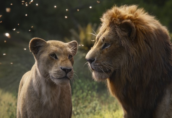This image released by Disney shows Nala, voiced by Beyoncé Knowles-Carter, left, and Simba, voiced by Donald Glover in a scene from &quot;The Lion King.&quot; (Disney via AP)