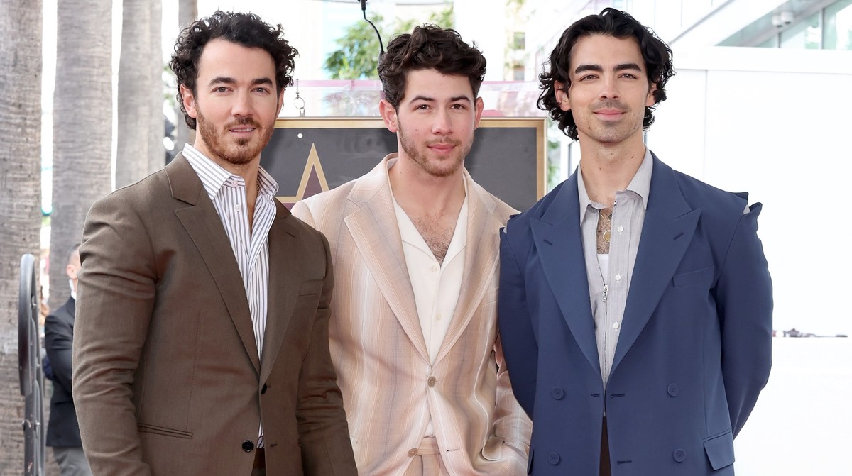 HOLLYWOOD, CALIFORNIA - JANUARY 30: (L-R) Kevin Jonas, Nick Jonas, and Joe Jonas of The Jonas Brothers attend The Hollywood Walk of Fame star ceremony honoring The Jonas Brothers on January 30, 2023 i ...