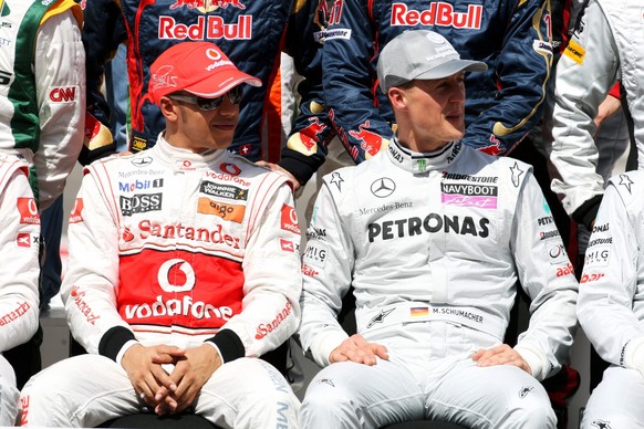 L to R: Lewis Hamilton GBR McLaren with Michael Schumacher GER Mercedes GP. Formula One World Championship, WM, Weltmeisterschaft Rd 1, Bahrain Grand Prix, Race Day, Bahrain International Circuit, Sak ...