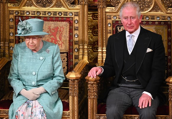 LONDON, ENGLAND - DECEMBER 19: Queen Elizabeth II and Prince Charles, Prince of Wales attend the State Opening of Parliament in the House of Lord&#039;s Chamber on December 19, 2019 in London, England ...
