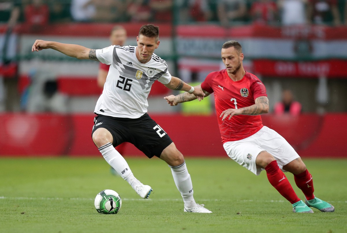 Soccer Football - International Friendly - Austria vs Germany - Worthersee Stadion, Klagenfurt, Austria - June 2, 2018 Germany’s Niklas Sule in action with Austria&#039;s Marko Arnautovic REUTERS/Lisi ...