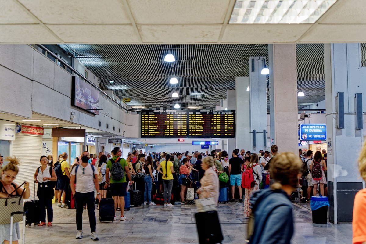 Departure yone at heraklion airpot with dparture table - Greece, Crete - Georgioupolis - 2022.07 xkwx crete, departure, greece, heraklion, airport, table, tourist, travel, time, schedule, people, pass ...