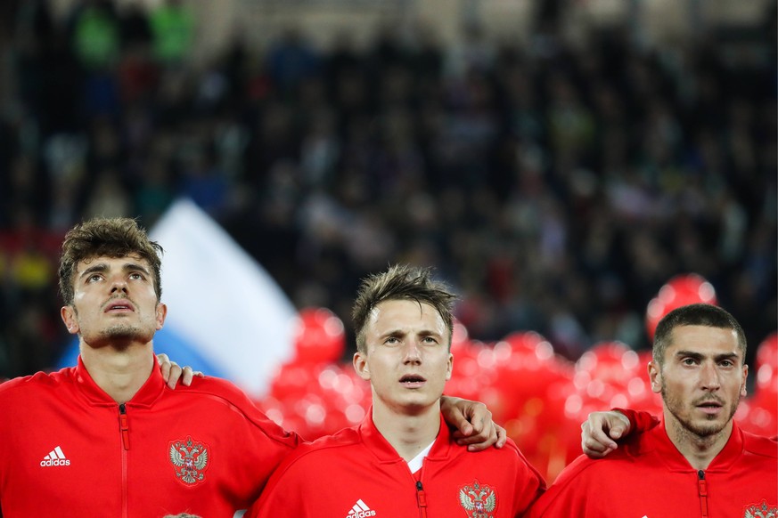 KALININGRAD, RUSSIA - OCTOBER 11, 2018: Russia s Roman Neustadter, Alexander Golovin, and Alexei Ionov (L-R) before a UEFA National League Group 2 League B football match between Russia and Sweden at  ...