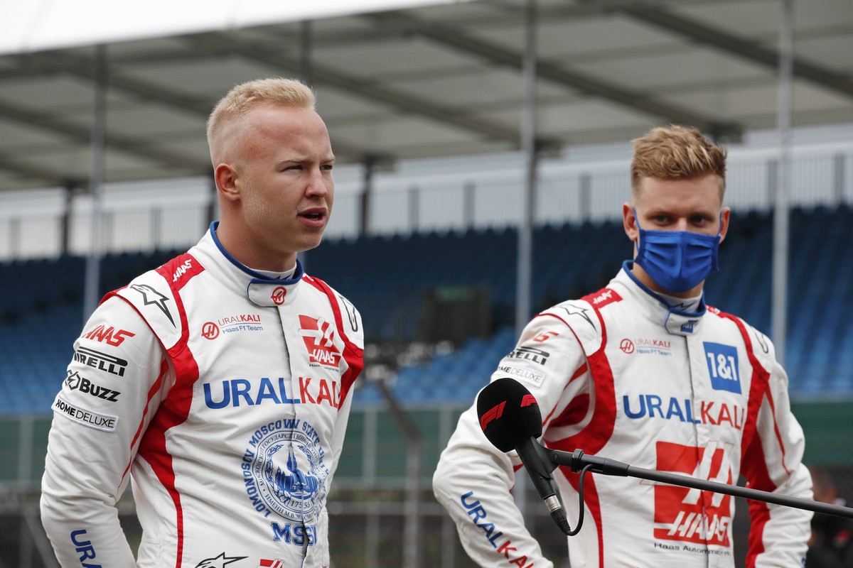 Formula 1 2021: British GP SILVERSTONE CIRCUIT, UNITED KINGDOM - JULY 15: Nikita Mazepin, Haas F1, and Mick Schumacher, Haas F1, on the grid, ahead of the 2022 Formula 1 car unveiling during the Briti ...