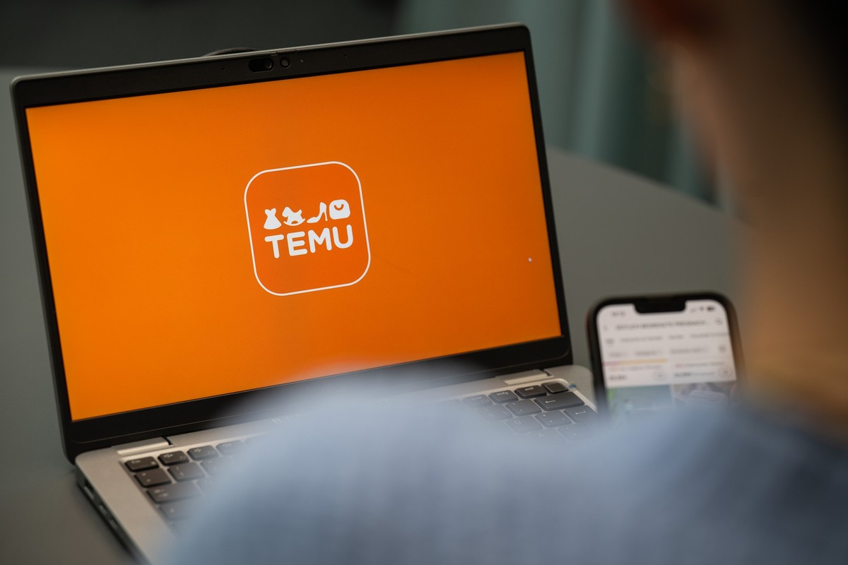 ILLUSTRATION - 29.08.2023, Berlin: Blick auf einen Laptop mit dem Logo des Shoppingportals Temu. (gestellte Szene). (zu dpa: �Shoppingportale: Politischer Druck auf Temu und Shein steigt�) Foto: Hanne ...
