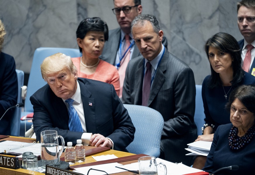 President Donald Trump listens to a council member at a United Nations Security Council meeting during the 73rd session of the United Nations General Assembly, at U.N. headquarters, Wednesday, Sept. 2 ...