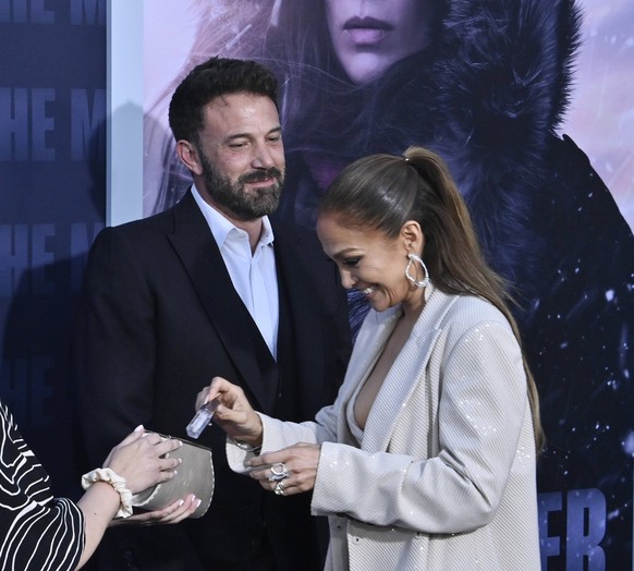 Cast member Jennifer Lopez and her husband, actor Ben Affleck attend the premiere of the motion picture thriller The Mother at the Regency Village Theatre in the Westwood section of Los Angeles on Wed ...