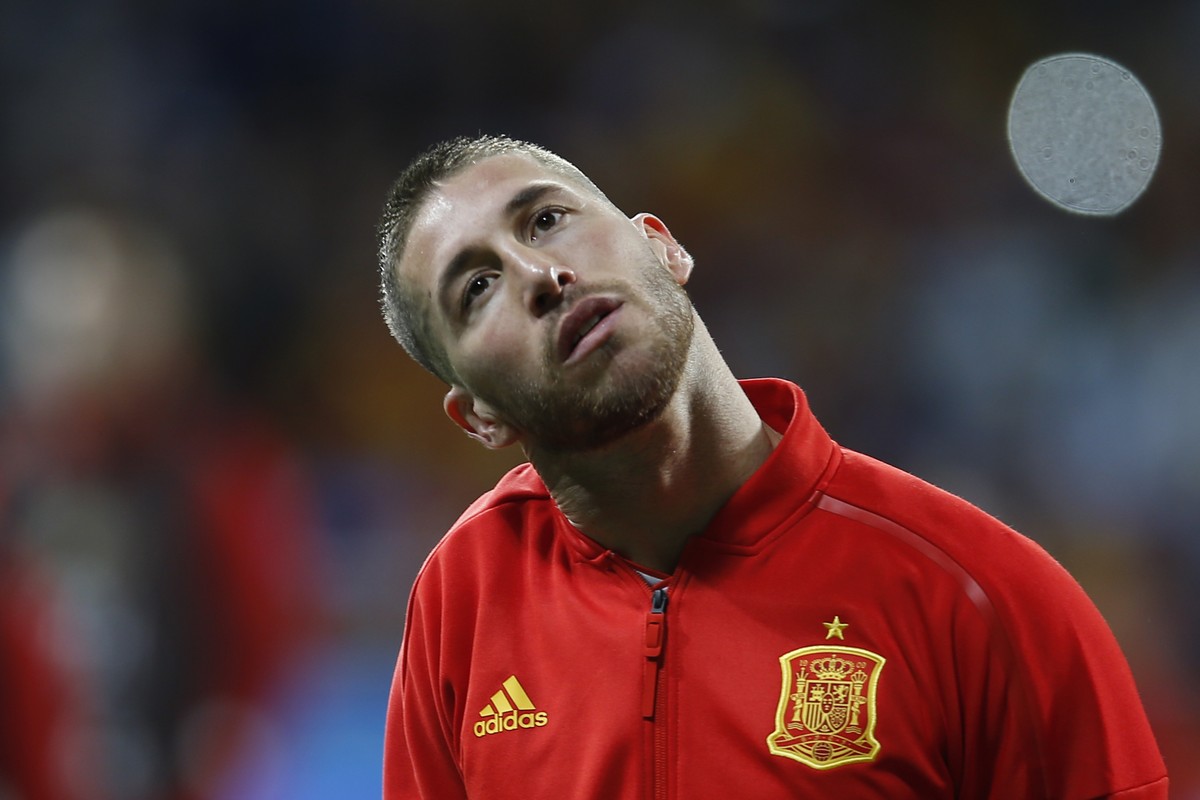 FILE - In this March 27, 2018 file photo, Spain&#039;s Sergio Ramos listens to the national anthem before the international friendly soccer match between Spain and Argentina at the Wanda Metropolitano ...