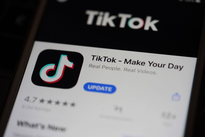 200830 -- BEIJING, Aug. 30, 2020 -- The logo of TikTok is seen on a smartphone screen in Arlington, Virginia, the United States, Aug. 30, 2020. TO GO WITH Planned TikTok deal entails China s approval  ...