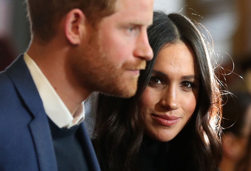 EDINBURGH, SCOTLAND - FEBRUARY 13: Prince Harry and Meghan Markle attend a reception for young people at the Palace of Holyroodhouse on February 13, 2018 in Edinburgh, Scotland. (Photo by Andrew Milli ...
