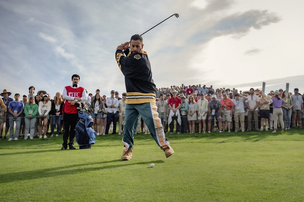 This image released by Netflix shows Adam Sandler in a scene from "Happy Gilmore 2." (Scott Yamano/Netflix via AP)