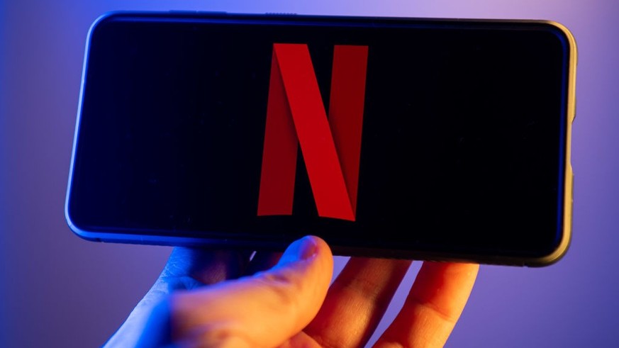 POLAND - 2023/02/07: In this photo illustration, a Netflix logo seen displayed on a smartphone. (Photo Illustration by Mateusz Slodkowski/SOPA Images/LightRocket via Getty Images)