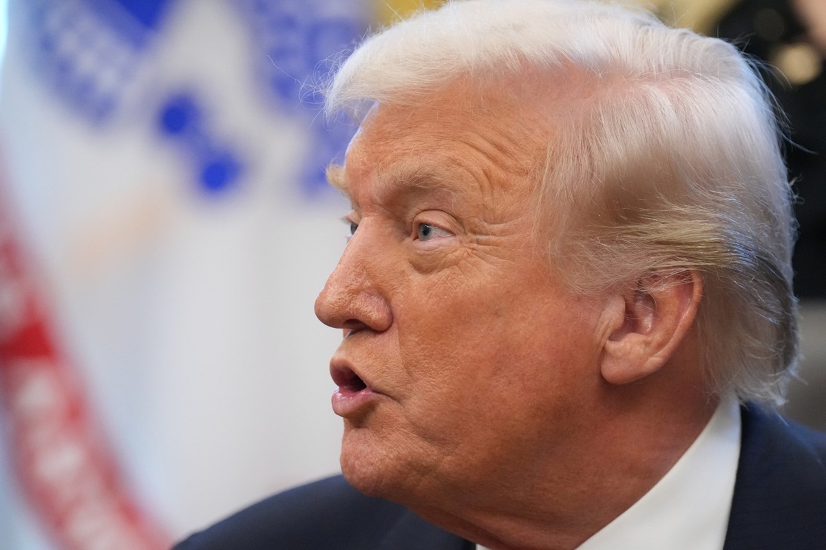 President Donald Trump speaks to reporters after Vice President JD Vance sworn in U.S. Ambassador to India Sergio Gor in the Oval Office of the White House, Monday, Nov. 10, 2025, in Washington. (AP P ...